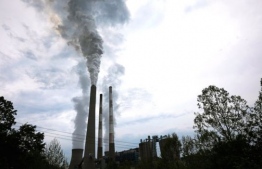 Exhaust rises from the stacks of the Harrison Power Station in Haywood, West Virginia:  Analysts estimate that energy-related CO2 emissions grew 3.4 percent from 2017 to 2018, which would be the largest increase in the United States since 2010.