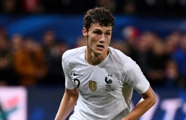 (FILES) In this file photo taken on October 11, 2018, France's defender Benjamin Pavard plays the ball during the friendly football match between France and Iceland at the Roudourou Stadium in Guingamp, western France. - As German first division Bundesliga football club FC Bayern Munich announced on January 9, 2019, Pavard has signed a five-years-contract with the German record masters. (Photo by FRANCK FIFE / AFP)