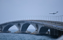 A photograph of the Sinamale' Bridge - the largest infrastructural project undertaken by Maldives till date, negatively impacting the surf break of Capital city Male' and completely destroying the surf break on airport island Hulhule. The project is trumped only by the 'Greater Male' Connectivity Project' which will see the development of three additional bridges linking the six islands that make up the  'Greater Male' Region' together. PHOTO: HUSSAIN WAHEED / MIHAARU