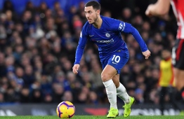 Chelsea's Belgian midfielder Eden Hazard runs with the ball during the English Premier League football match between Chelsea and Southampton at Stamford Bridge in London on January 2, 2019. (Photo by Ben STANSALL / AFP) / RESTRICTED TO EDITORIAL USE. No use with unauthorized audio, video, data, fixture lists, club/league logos or 'live' services. Online in-match use limited to 120 images. An additional 40 images may be used in extra time. No video emulation. Social media in-match use limited to 120 images. An additional 40 images may be used in extra time. No use in betting publications, games or single club/league/player publications. / 