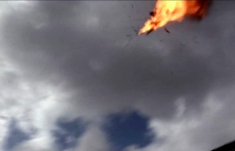 An image grab taken from a video obtained by AFPTV shows the moment a drone exploded above Yemen's al-Anad airbase in the government-held southern province of Lahj on January 10, 2019. Six soldiers were killed in a rebel drone attack on Yemen's largest airbase, hospital sources told AFP. Another 12 people were wounded in the attack on the airbase, medics said.
Nabil HASSAN / AFPTV / AFP