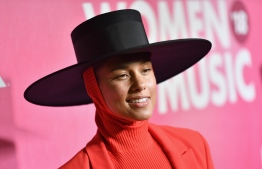 (FILES) In this file photo taken on December 6, 2018 US musician Alicia Keys attends Billboard's 13th Annual Women In Music event at Pier 36 in New York City. - American singer and songwriter Alicia Keys will host the Grammy Awards next month, she announced on January 15, 2019, one year after the gala came under fire over diversity concerns. Keys -- herself a 15-time Grammy winner -- will be the emcee for music's biggest night, which this year features a diverse slate of women and hip hop artists as leading contenders. "I know what it feels like to be on that stage, and I know what it feels like to be proud of the work that you've put in and to be recognized for it," Keys said in a video posted on social media."I feel like it's the perfect opportunity for me to give the light back and lift people up -- especially all the young women that are nominated," she added. (Photo by Angela Weiss / AFP)