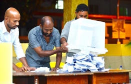 Officials counting the votes of Meedhoo, Addu Atoll polling booth stationed in capital Male City. PHOTO: AHMED NISHAATH/MIHAARU