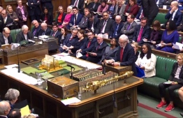 A video grab from footage broadcast by the UK Parliament's Parliamentary Recording Unit (PRU) shows Britain's opposition Labour Party leader Jeremy Corbyn as he speaks during the weekly Prime Minister's Questions (PMQs) in the House of Commons in London on January 23, 2019. - British MPs frustrated with Prime Minister Theresa May's Brexit strategy are seeking to force a new approach, which could include delaying Britain's exit from the EU and holding a second referendum. (Photo by HO / PRU / AFP) / 