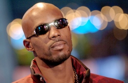 (FILES) In this file photo taken on April 6, 2006,Rapper DMX makes an appearance on MTV 2 Presents Sucker Free Week in New York City. - DMX was released early on January 25, 2018, from a West Virginia federal prison after serving a year behind bars for tax fraud, his lawyer told AFP. The 48-year-old performer whose real name is Earl Simmons pleaded guilty in November 2017 to evading $1.7 million in US tax payments. (Photo by Bryan Bedder / GETTY IMAGES NORTH AMERICA / AFP)