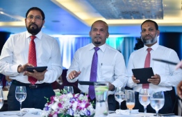 L-R: Jumhooree Party's leader Qasim Ibrahim, Elections Commission's President Ahmed Shareef, and Home Minister Imran Abdulla at the inauguration of EC's new logo and official colour. PHOTO/MIHAARU