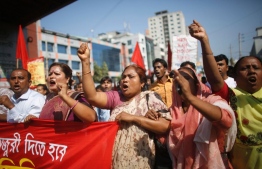 Bangladeshi garment factory workers taking part in a protest. PHOTO: AL JAZEERA AMERICA