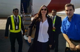 US actress and humanitarian Angelina Jolie, a special envoy for the United Nations High Commissioner for Refugees (UNHCR), arrives at the airport in Cox's Bazar in southern Bangladesh on February 4, 2019, ahead of a visit to nearby Rohingya refugee camps. - UNHCR Special Envoy Angelina Jolie is visiting the refugee camps for Rohingya communities in southern Bangladesh who have fled violence in neighbouring Myanmar. (Photo by STR / AFP)