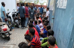 Immigrants queued up for registration and screening. PHOTO: MIHAARU