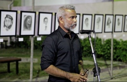 Ahmed Badeeu speaking at the opening ceremony of the Veeval Art Exhibition. PHOTO: SIRA