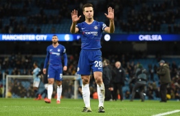 Chelsea's Spanish defender Cesar Azpilicueta applauds the fans following the English Premier League football match between Manchester City and Chelsea at the Etihad Stadium in Manchester, north west England, on February 10, 2019. - Manchester City won the match 6-0. (Photo by Oli SCARFF / AFP)