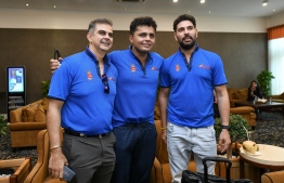 Yuvraj Singh (R) pose with some members of the Air India team, who arrived in Maldives on February 14, 2019, for the India-Maldives Friendship Cricket Series. PHOTO: NISHAN ALI/MIHAARU