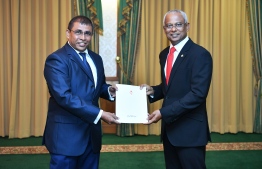 President Ibrahim Mohamed Solih presents credentials to the newly appointed Ambassador to Singapore Dr Abdulla Mausoom. PHOTO: PRESIDENT'S OFFICE