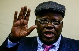 (FILES) In this file photo taken on June 1, 2018 MDC Alliance Spokesperson Tendai Biti speaks during a press conference where he announced that Zimbabwe's opposition parties are calling for electoral reforms ahead of the July 30 general elections and that there will be street demonstrations in the capital Harare on June 5. - A Zimbabwe court on February 18, 2019 convicted leading opposition figure Tendai Biti of an election crime and fined him for announcing his own results for presidential polls last July, which he claimed he won. Biti, a respected former finance minister, proclaimed his Movement for Democratic Change (MDC) the victor of the contested July 30 poll which sparked anti-government protests that were put down by soldiers. (Photo by Jekesai NJIKIZANA / AFP)