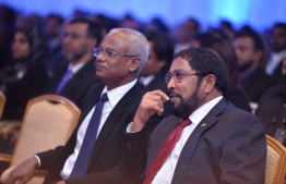 [File] President Ibrahim Mohamed Solih (L) and JP leader Qasim Ibrahim