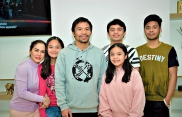 Manny Pacquiao, son Emmanuel Jr (6R) and family. PHOTO: MANNY PACQUIAO/TWITTER