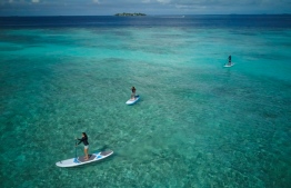 Dr Claire Petros, Dhafeena Hassan Ibrahim and Shaziya Saeed of the Stand Up for Our Seas team, on their paddleboards. PHOTO/STAND UP FOR OUR SEAS