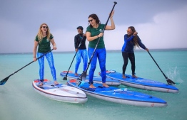 (From Left) Dr. Cal Major, Dhafeena Hassan, Dr. Claire Petros and Shaziya Saeed take off from Coco Palm Dhuni Kolhu to Thulhadhoo Island. PHOTO: STAND UP FOR OUR SEAS