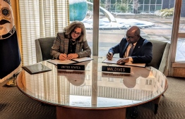 Minister of Foreign Affairs Abdulla Shahis (R) and Principal Deputy Coordinator on Counter-terrorism at the US Department of State, Alina Romanowski (L) signing the aviation security agreement. PHOTO: MINISTRY OF FOREIGN AFFAIRS