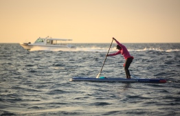 Dhafy of the Stand Up for Our Seas team on her SUP. PHOTO: JAMES APPLETON/ STAND UP FOR OUR SEAS