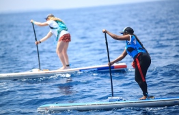 Dr Cal Major and Shaziya Saeed pictured paddling. PHOTO: JAMES APPLETON