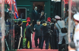 North Korean leader Kim Jong Un (C) arrives at the Dong Dang railway station in Dong Dang, Lang Son province, on February 26, 2019, to attend the second US-North Korea summit. - North Korean leader Kim Jong Un crossed into Vietnam on February 26 after a marathon train journey for a second summit showdown with Donald Trump, with the world looking for concrete progress over the North's nuclear programme. (Photo by Nhac NGUYEN / AFP)