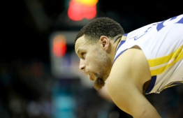 Stephen Curry started slow but stepped up his scoring when it counted the most in the fourth quarter in a thrilling victory over Philadelphia PHOTO: STREETER LECKA/AFP