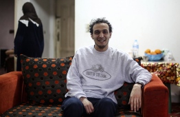 Egyptian photojournalist Mahmoud Abu Zeid, widely known as Shawkan, is pictured at his home in the capital Cairo on March 4, 2019. - Award-winning Egyptian photojournalist Mahmoud Abu Zeid, widely known as Shawkan, was released from jail on March 4, 2019 after spending nearly six years in prison, his lawyer said. Shawkan, who last year received UNESCO's World Freedom Prize, was arrested in 2013 while he was covering August clashes between security forces and supporters of ousted Islamist president Mohamed Morsi. (Photo by MOHAMED EL-RAAI / AFP)