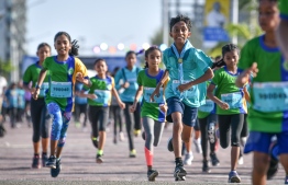Kids take part in the 'KidSmile' category on the final day of the Maldives International Marathon. PHOTO: NISHAN ALI/MIHAARU