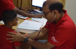 A boy receiving consultation duiringTiny Hearts 'Care for Tiny Hearts Camp'. PHOTO: TINY HEARTS MALDIVES