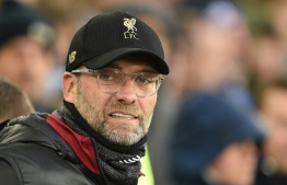 Liverpool's German manager Jurgen Klopp looks on before the English Premier League football match between Everton and Liverpool at Goodison Park in Liverpool, north west England on March 3, 2019. PHOTO: Oli SCARFF / AFP