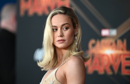 (FILES) In this file photo taken on March 4, 2019 US actress Brie Larson attends the world premiere of "Captain Marvel" in Hollywood, California. - "Captain Marvel," the first Marvel Studios/Disney superhero film with a female lead, has soared to rare heights in North American theaters, with whopping weekend ticket sales of $153 million, industry watcher Exhibitor Relations reported. Added to the $302 million taken in internationally, the film's estimated total of $455 million for the three-day weekend would give it the sixth highest global debut ever, according to Variety, and the best domestic start for a superhero film since Disney and Marvel's "Black Panther" opened last year with $202 million. (Photo by Robyn Beck / AFP)