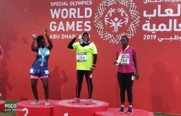 Gold Medalist Shifna Ibrahim (C) at the Special Olympics World Games. PHOTO: MINISTRY OF YOUTH, SPORTS AND COMMUNITY DEVELOPMENT