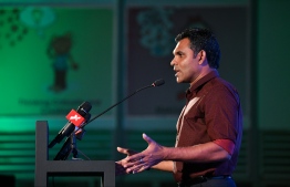 Vice President Faisal Naseem speaking at Faris Maumoon's campaign rally for the upcoming parliamentary elections. PHOTO: HUSSAIN WAHEED / MIHAARU