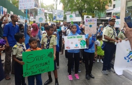 School students and children lead the Earth Hour Maldives Climate March. PHOTO: AMERICAN CENTER MALE'