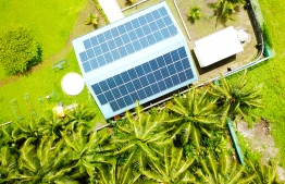 Aerial view of solar panels on the roof of a building. The World Bank has approved a new project worth USD 107.4 million to help accelerate the transition of Maldives to renewable energy.