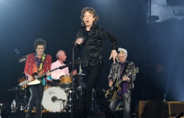 (FILES) In this file photo taken on October 9, 2017 singer of British rockband the Rolling Stones, Mick Jagger, performs at the Esprit arena during the Rolling Stones tour "Stones - No Filter"  in Duesseldorf, western Germany. - Rolling Stones frontman Mick Jagger will undergo surgery to replace a heart valve, with the band postponing the North American leg of a tour as a result, a report said April 1, 2019. The iconic British band had announced Saturday it was delaying the "No Filter" tour for the 75-year-old rocker to receive an unspecified medical treatment. (Photo by PATRIK STOLLARZ / AFP)