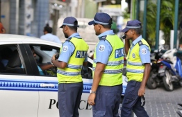 Maldives Police Service personnel in the line of duty. PHOTO: HUSSAIN WAHEED / MIHAARU