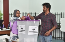 A man casts his ballot during the Parliamentary Election 2019. PHOTO: NISHAN ALI / MIHAARU