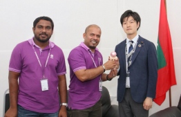 Parliamentary Vice Minister for Foreign Affairs of Japan, Norikazu Suzuki (R), presents Elections Commission President Ahmed Shareef with a kendama, during his courtesy call to the electoral watchdog on the day of Parliamentary Election 2019. PHOTO/ELECTIONS COMMISSION