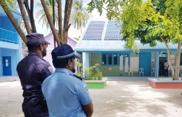 Two police officers operating in polling stations of Villingili, Gaafu Alif Atoll. PHOTO: POLICE MEDIA