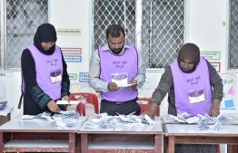 Elections Commission Officials counting ballot papers in a polling station. PHOTO: NISHAN ALI / MIHAARU