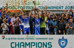 Villa International High School lifts the U-19 interschool football trophy. PHOTO: NISHAN ALI / MIHAARU