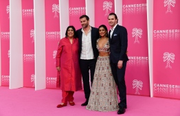 British-Indian screen writer and film director Gurinder Chadha (L), creator of the British TV show Beecham House, poses with actors (Lto R) Gregory Fitoussi, Pallavi Shada and Tom Bateman during the 2019 Cannes International Series festival, in Cannes on April 7, 2019. - Canneseries aims to highlight series from all over the world and to give an international voice to this increasingly popular and fiercely creative new art form. (Photo by YANN COATSALIOU / AFP)