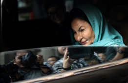 Former Malaysian prime minister Najib Razak's wife Rosmah Mansor leaves the High Court after facing corruption charges in Kuala Lumpur on April 10, 2019. (Photo by SADIQ ASYRAF / AFP)