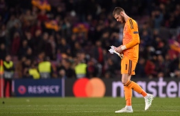 Manchester United's Spanish goalkeeper David De Gea leaves after the UEFA Champions League quarter-final second leg football match between Barcelona and Manchester United at the Camp Nou stadium in Barcelona on April 16, 2019. (Photo by Josep LAGO / AFP)