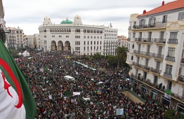 Algerians take part in a demonstration against ailing President Abdelaziz Bouteflika in front of La Grande Poste (main post office) in the centre of the capital Algiers on March 22, 2019. - Bouteflika said on February 22 he would run for a fifth term in April 18 elections, despite concerns about his ability to rule. The 82-year-old uses a wheelchair and has rarely appeared in public since suffering a stroke in 2013. Following initial protests, he made the surprise announcement on March 11 that he was pulling out of the race -- and also postponed the polls. PHOTO: AFP