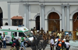 Police and relevant authorities responding to the bomb blasts that took place in three churches and three hotels in Sri Lanka on Sunday morning. PHOTO: AFP