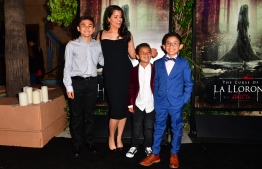 From the cast, (from L) Aiden Lewandowski, Marisol Ramirez, who plays La Llorona, Oliver Alexander and Jayden Valdivia arrive for the premiere of "The Curse of La Llorona" at the Egyptian Theater in Hollywood on April 15, 2019. (Photo by Frederic J. BROWN / AFP)
