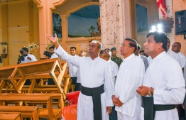This handout photo taken and released by the Sri Lankan President's Office on April 23, 2019 shows President Maithripala Sirisena (2nd R) visiting St. Sebastian's church in Negombo, two days after a series of bomb attacks targeting churches and luxury hotels in Sri Lanka. - Sri Lanka began a day of national mourning April 23 with three minutes of silence to honour more than 300 people killed in suicide bomb blasts that have been blamed on a local Islamist group. (Photo by Handout / SRI LANKAN PRESIDENT'S OFFICE / AFP) / -----EDITORS NOTE --- RESTRICTED TO EDITORIAL USE - MANDATORY CREDIT "AFP PHOTO / Sri Lankan President's Office " - NO MARKETING - NO ADVERTISING CAMPAIGNS - DISTRIBUTED AS A SERVICE TO CLIENTS